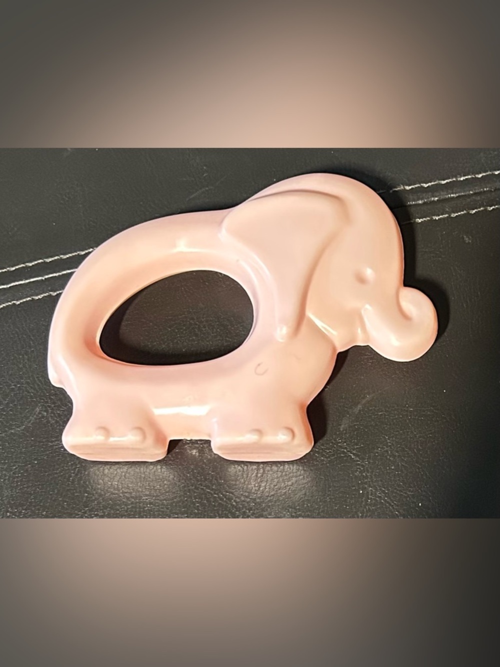 vintage 1970s Sanitoy elephant baby rattle or teether. Hard plastic, hollow